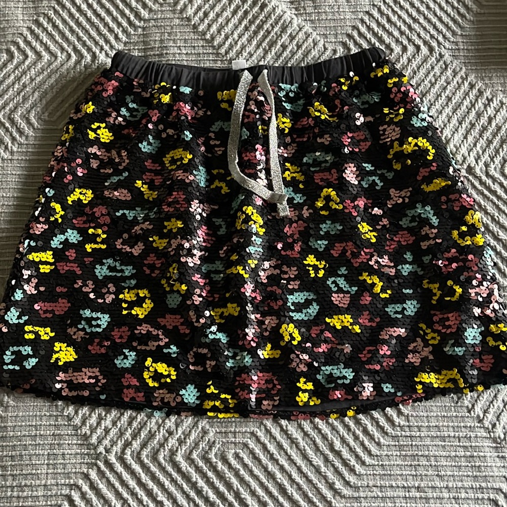 Sparkle time! Grab this perfect sequin skirt for your little! Size 8, never worn